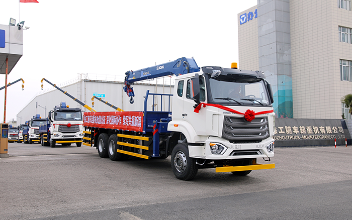 K8凯发SQS250随车起重机批量发车，助力 “一带一路” 沿线基建腾飞